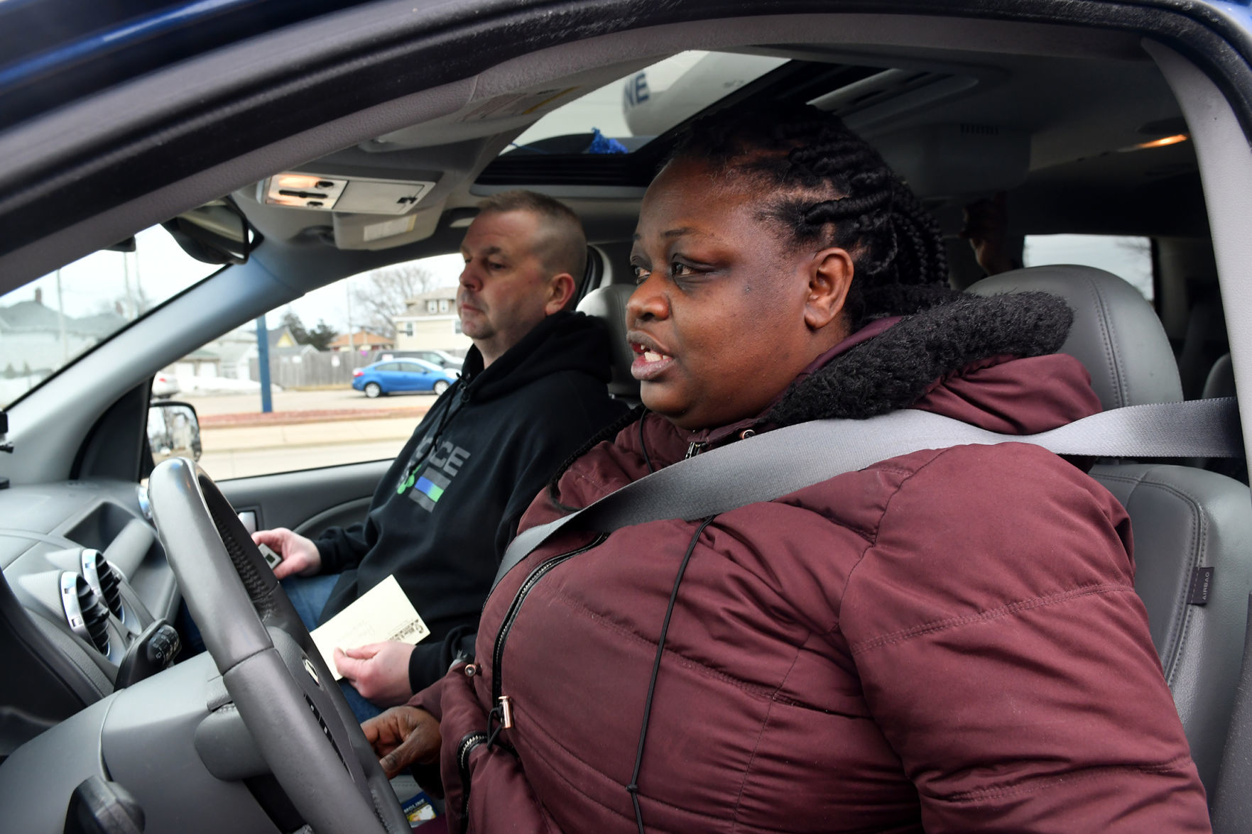 Moline police and Moline Municipal Credit Union give car away
